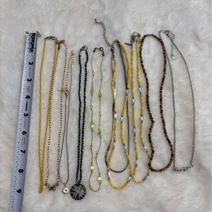 Lot of 9 assorted “choker” length necklaces- used